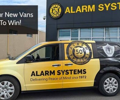 Feature Image-spot the van. Alarm Systems 50th anniversary van parked outside our Belleville Building